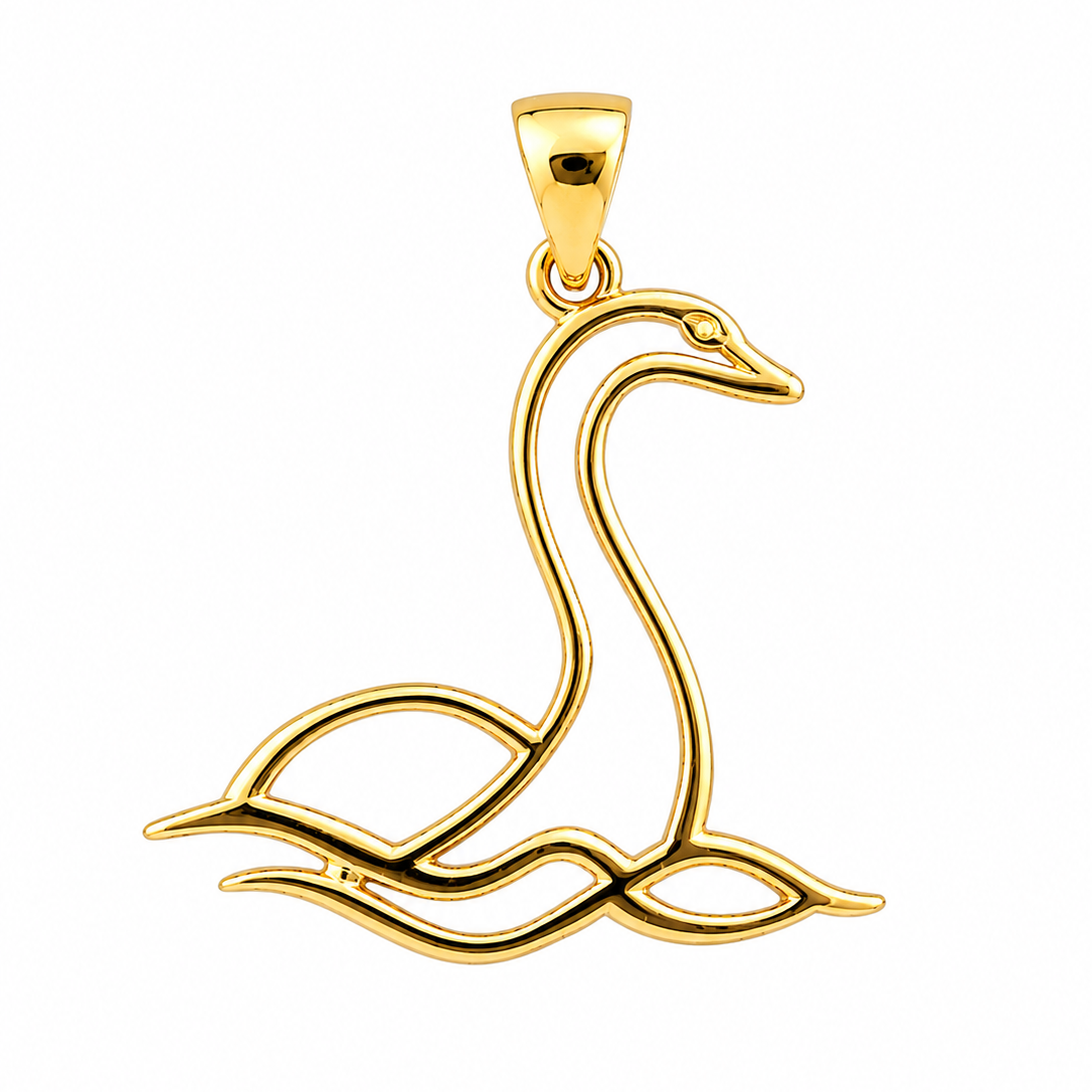 Close up of the high polish mirror finish on the gold vermeil silver Scottish Nessie statement pendant by Kolié
