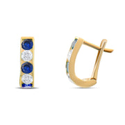 Kolié 9ct Yellow Gold Huggie Earrings with Sapphire Blue Zirconia - Kolié