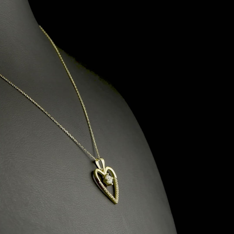 Elegant open heart pendant in 9ct yellow gold with cubic zirconia stones, perfect gift for her.