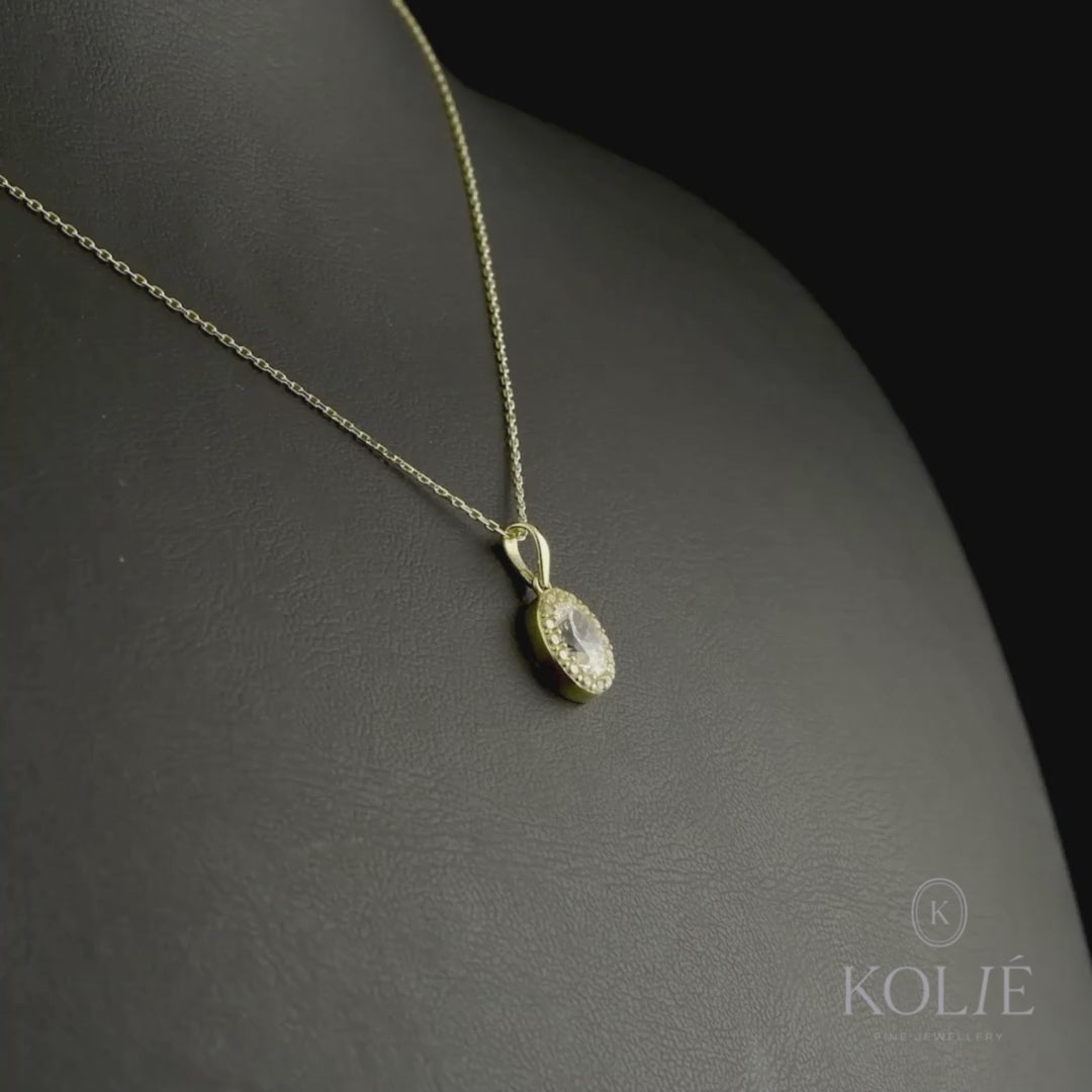 Kolié 9ct yellow gold necklace with pendant with an oval cubic zirconia