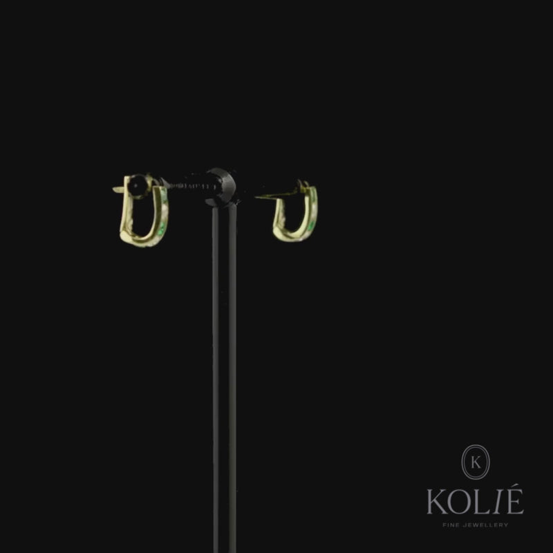 Kolié 9ct yellow gold bar earrings with bright green and clear cubic zirconia in a sleek pattern