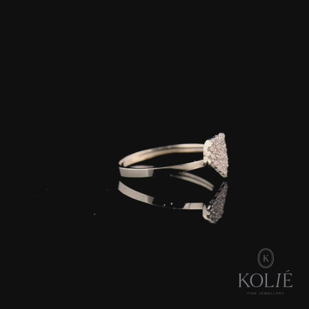 Kolié 9ct yellow gold ring featuring a heart-shaped cluster of cubic zirconia, embodying romantic sophistication.
